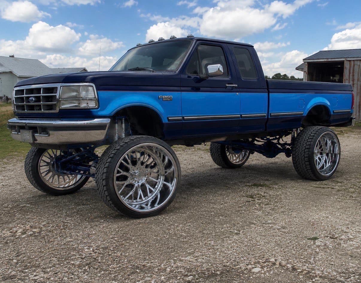 Custom lifted OBS Ford F-250 on chrome wheels — TP Customs LLC, Saint Paris Ohio
